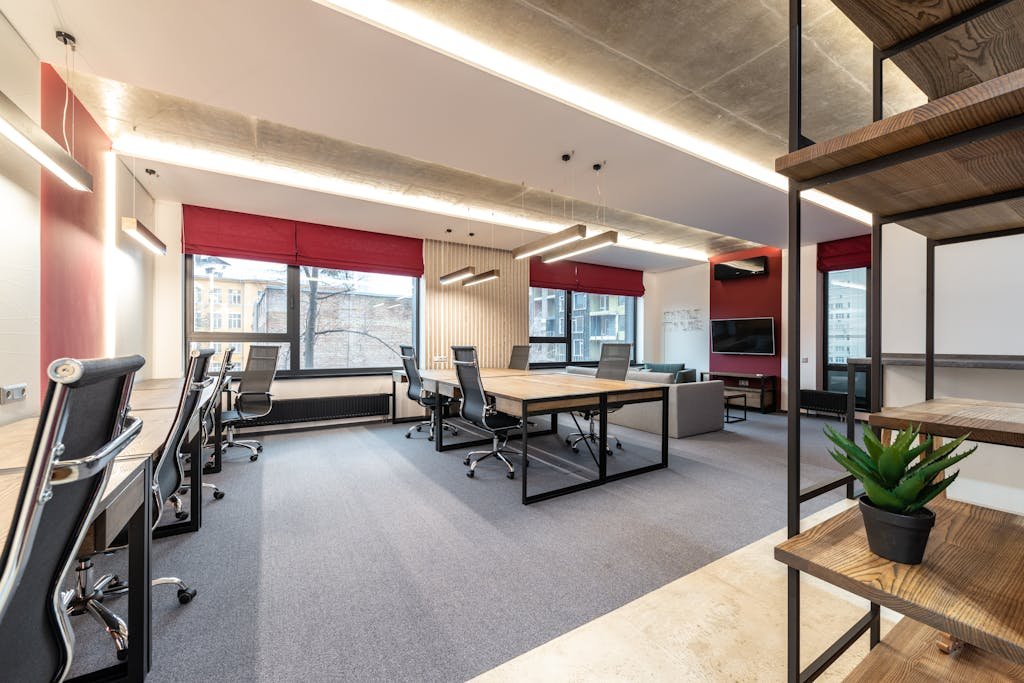 Photo by Max Vakhtbovycn Spacious and contemporary office interior with natural lighting and minimal decor.